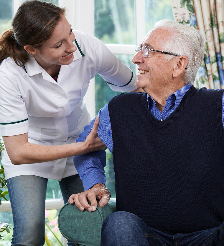 Care worker providing domiciliary care